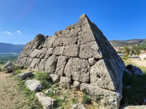 The ancient Pyramid of Hellinikon in Argos, Greece, featuring unique polygonal masonry – A mysterious site explored by Porto Planet.