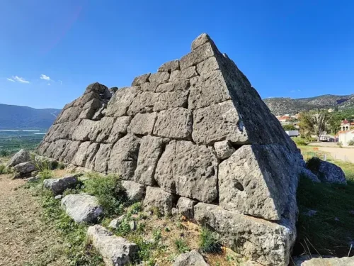 The ancient Pyramid of Hellinikon in Argos, Greece, featuring unique polygonal masonry – A mysterious site explored by Porto Planet.